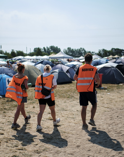 Three camping hosts going for a walk in the area